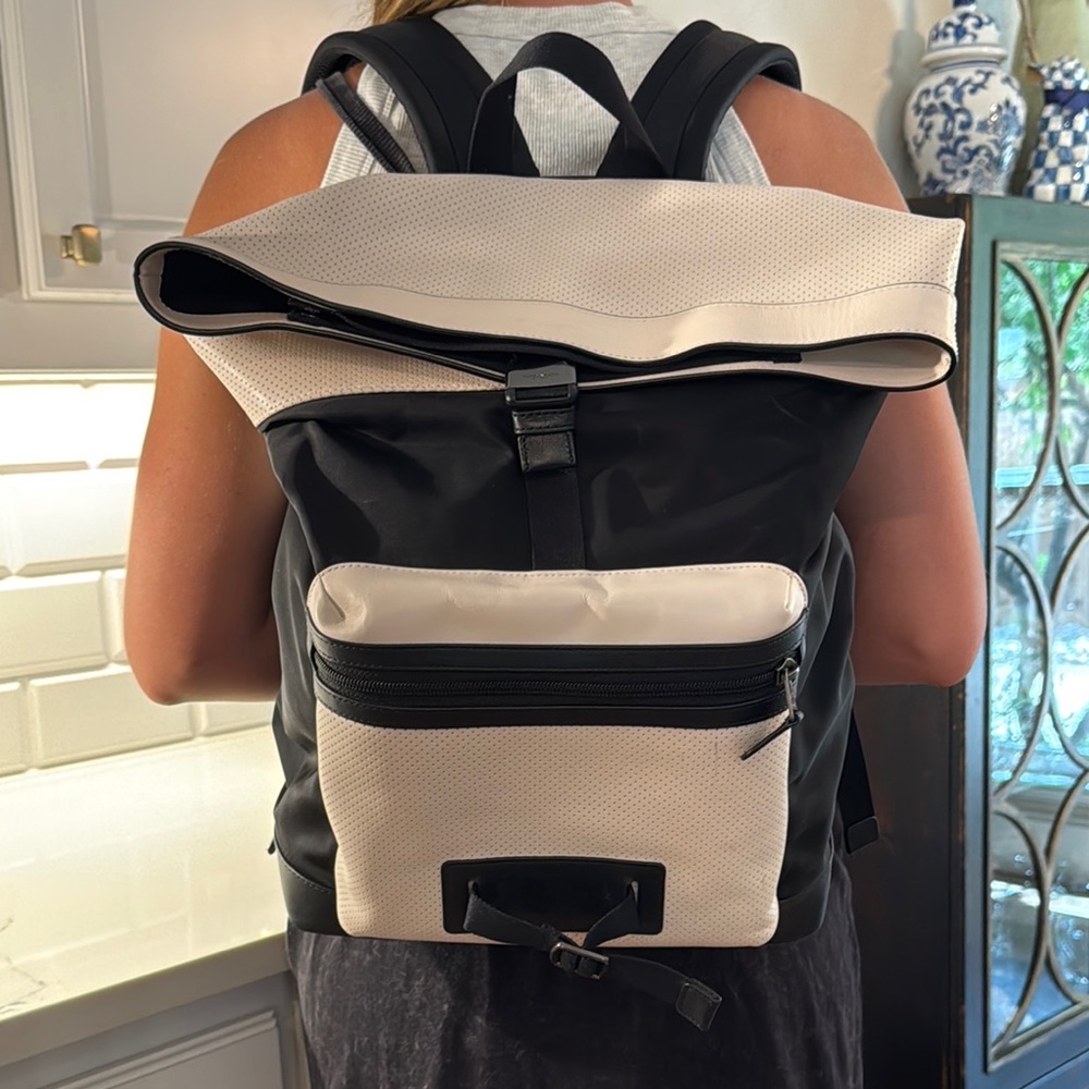 Coach Black and Cream Minimalist Backpack with Roll-Top Closure